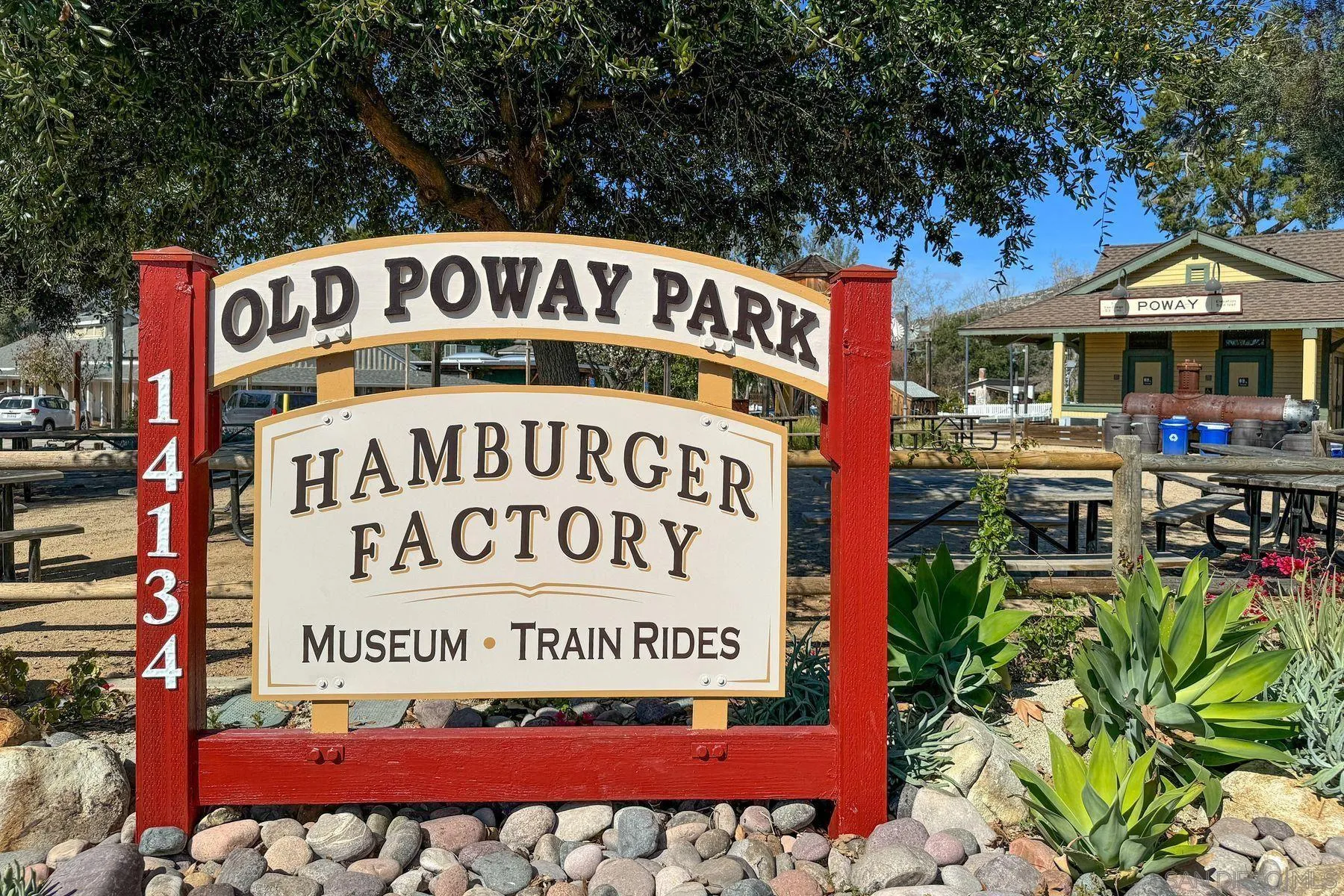 13821 Eisenhower Avenue Poway, CA 92064 - Photo 31 of 37 a sign on the side of a building