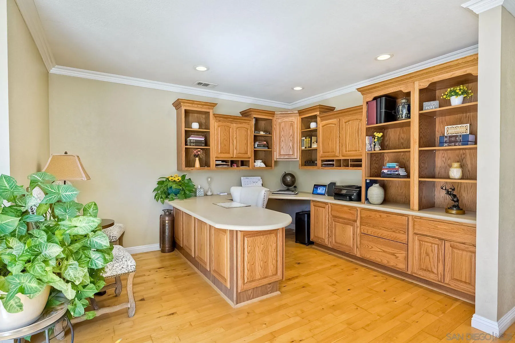 13821 Eisenhower Avenue Poway, CA 92064 - Photo 6 of 37 a large white kitchen with a stove a sink and dishwasher