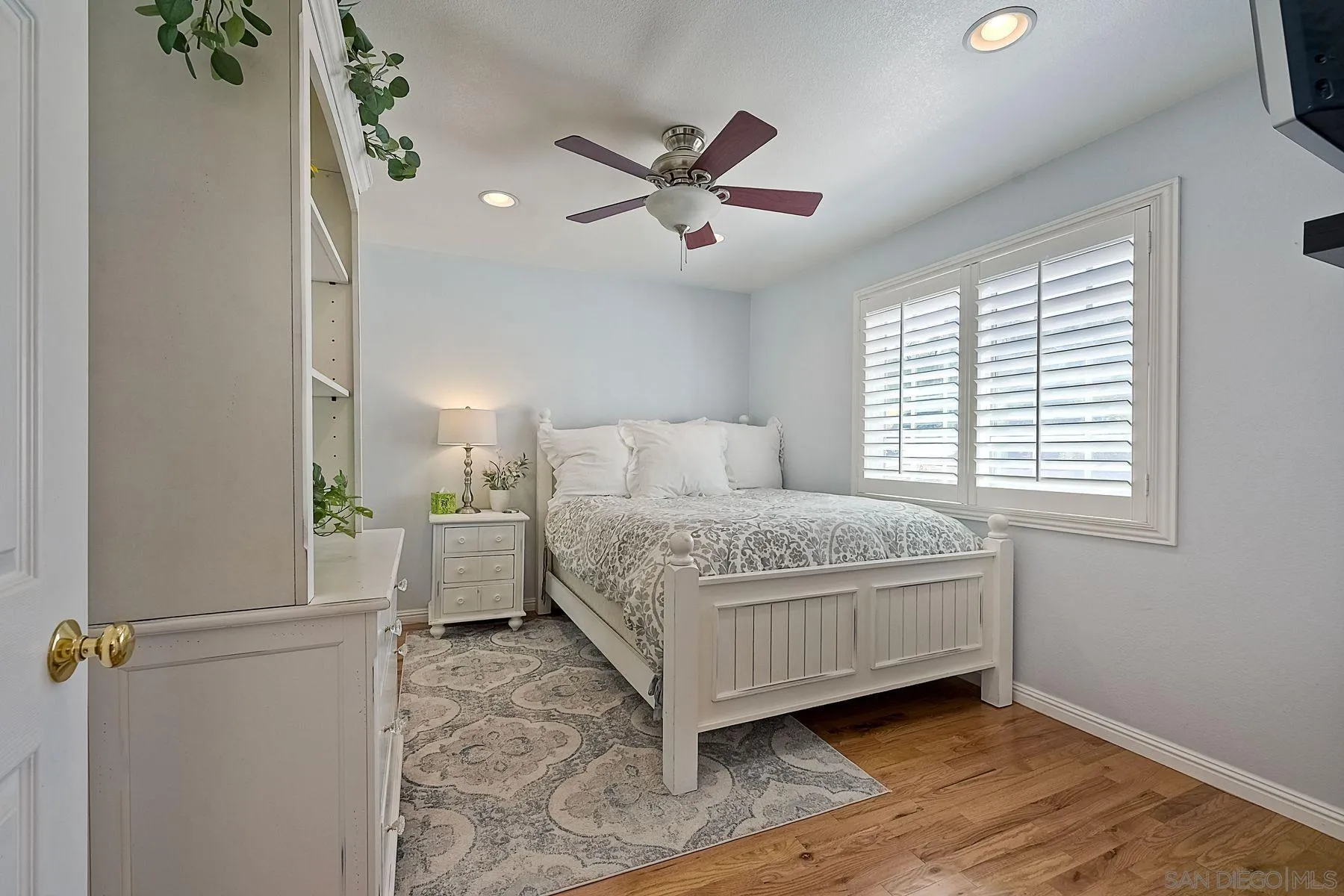13821 Eisenhower Avenue Poway, CA 92064 - Photo 7 of 37 a bedroom with a bed and a window