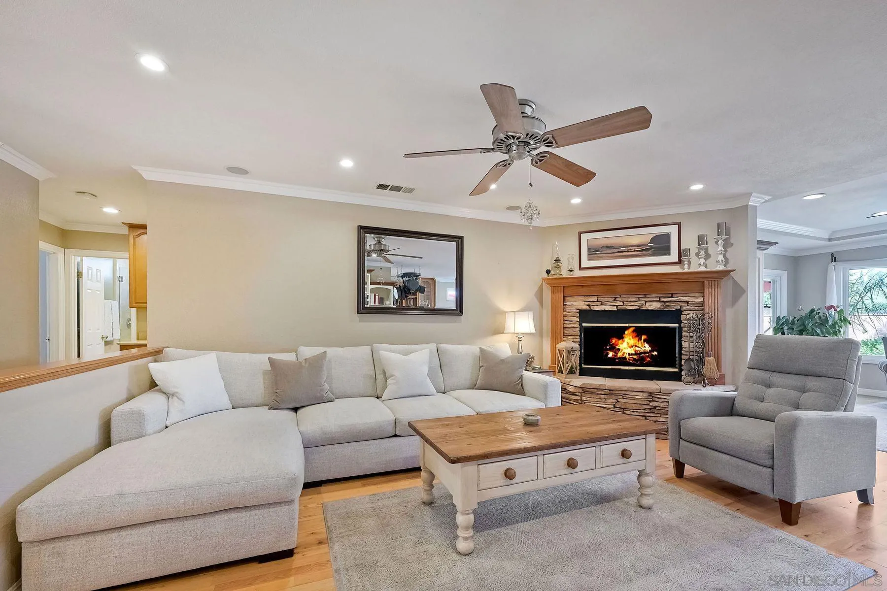 13821 Eisenhower Avenue Poway, CA 92064 - Photo 10 of 37 a living room with furniture and a fireplace