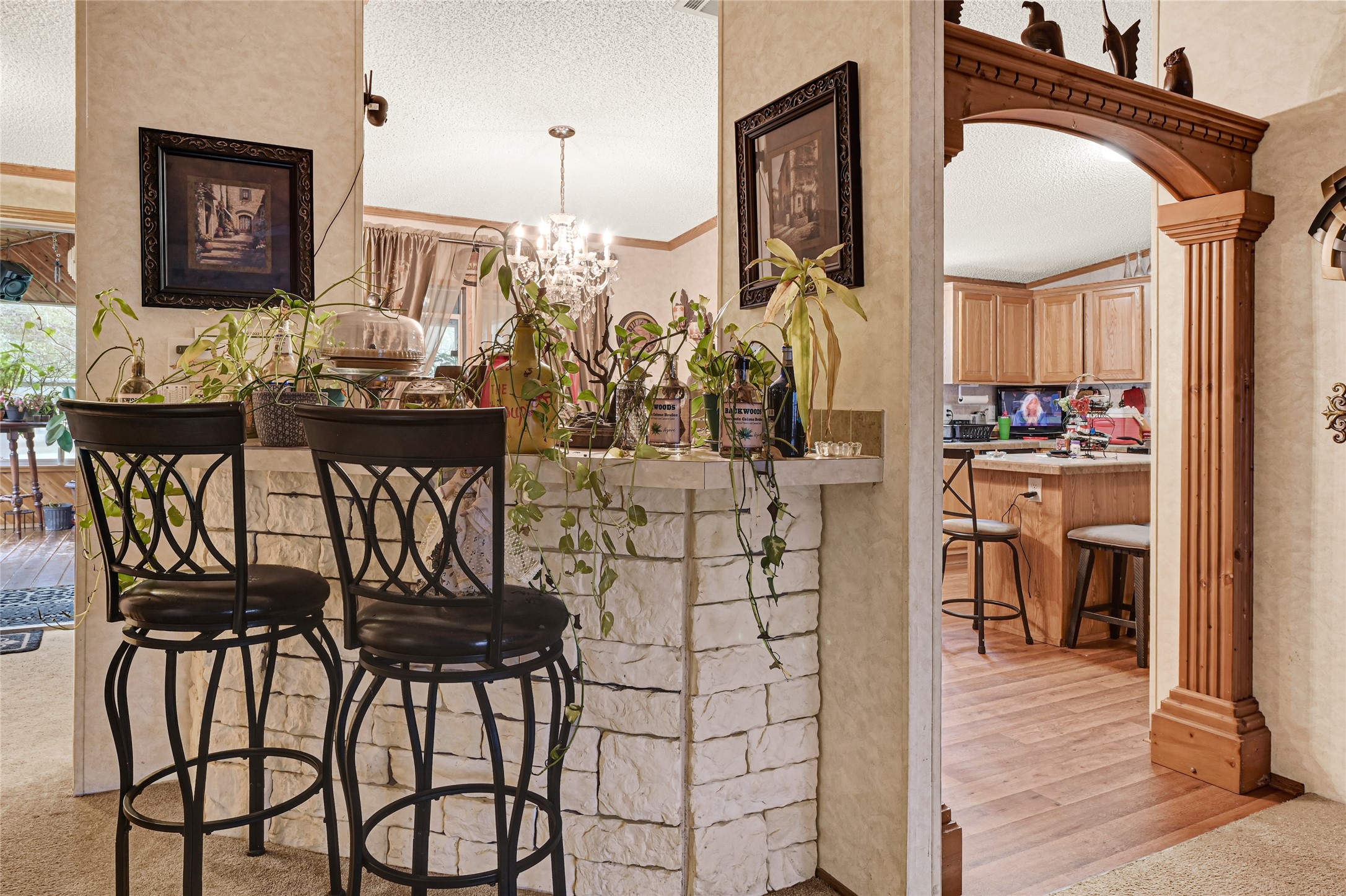 17106 Pickering Road Conroe, TX 77302 - Photo 12 of 50 a view of a dining room with furniture and chandelier