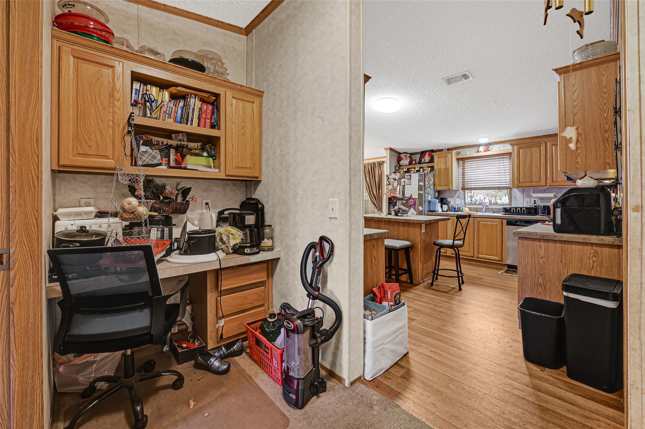 17106 Pickering Road Conroe, TX 77302 - Photo 21 of 50 a view of a workspace with furniture and toys