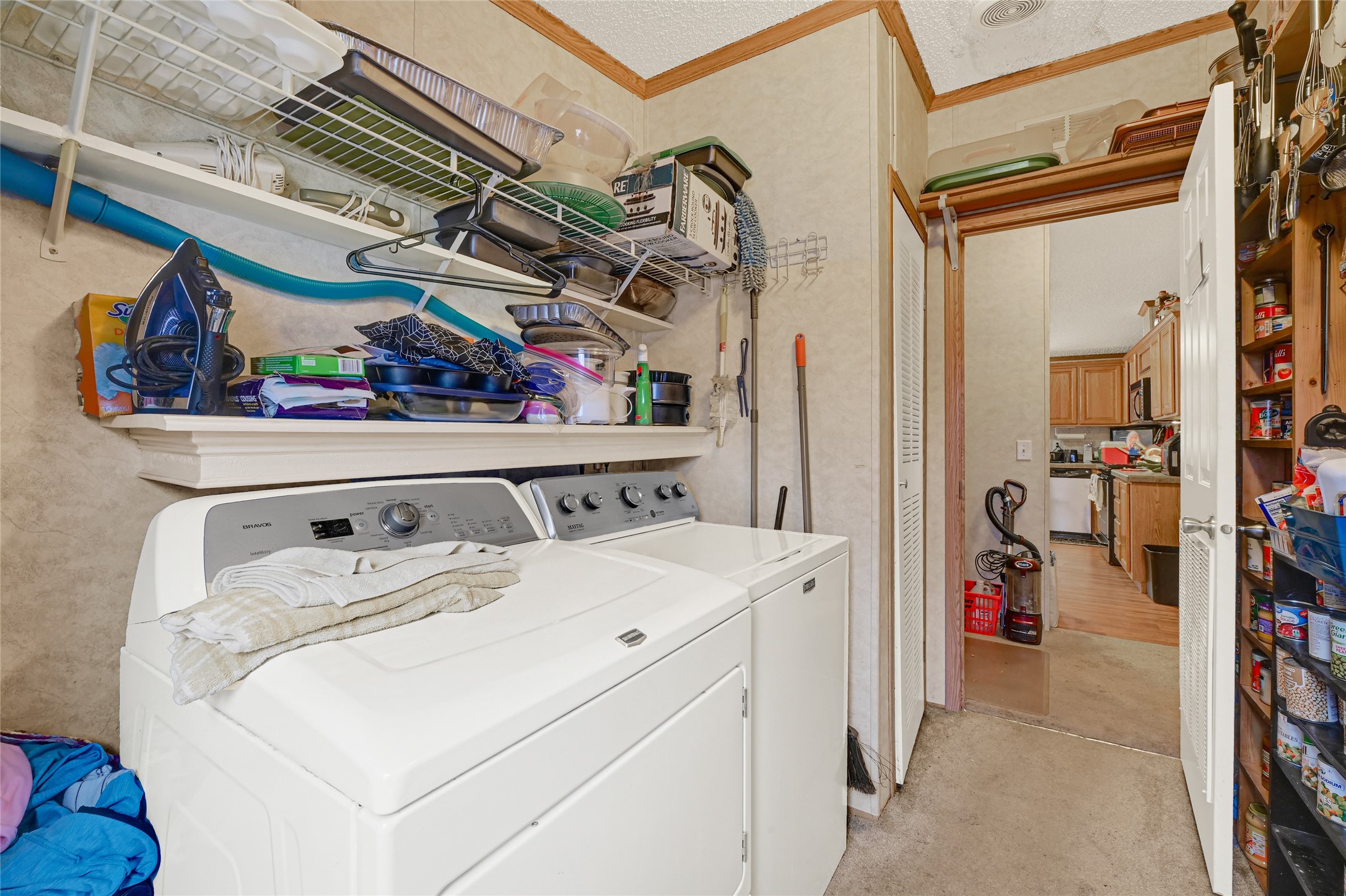 17106 Pickering Road Conroe, TX 77302 - Photo 24 of 50 a utility room with dryer and washer