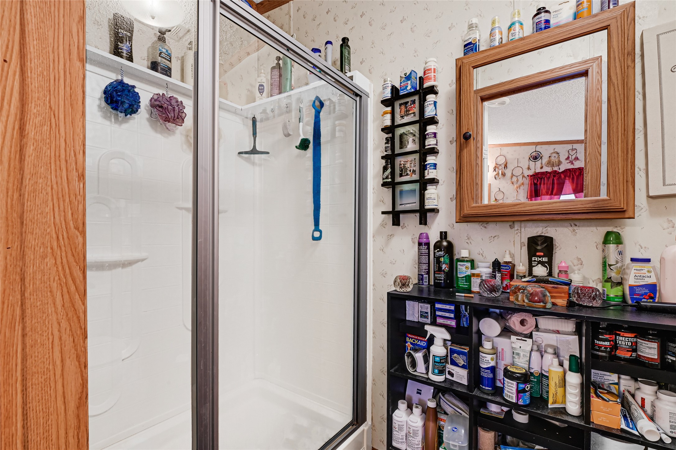 17106 Pickering Road Conroe, TX 77302 - Photo 27 of 50 a store room with lots of furniture and a refrigerator