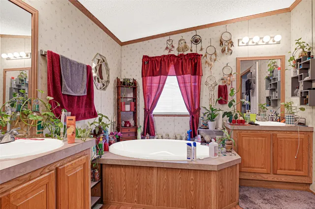 a room with red furniture and a large window