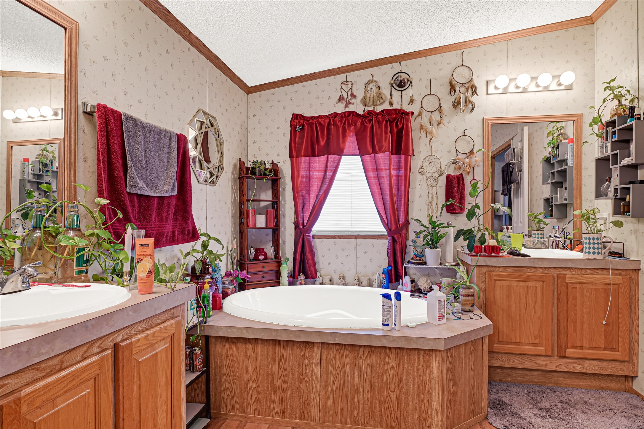 17106 Pickering Road Conroe, TX 77302 - Photo 4 of 50 a room with red furniture and a large window