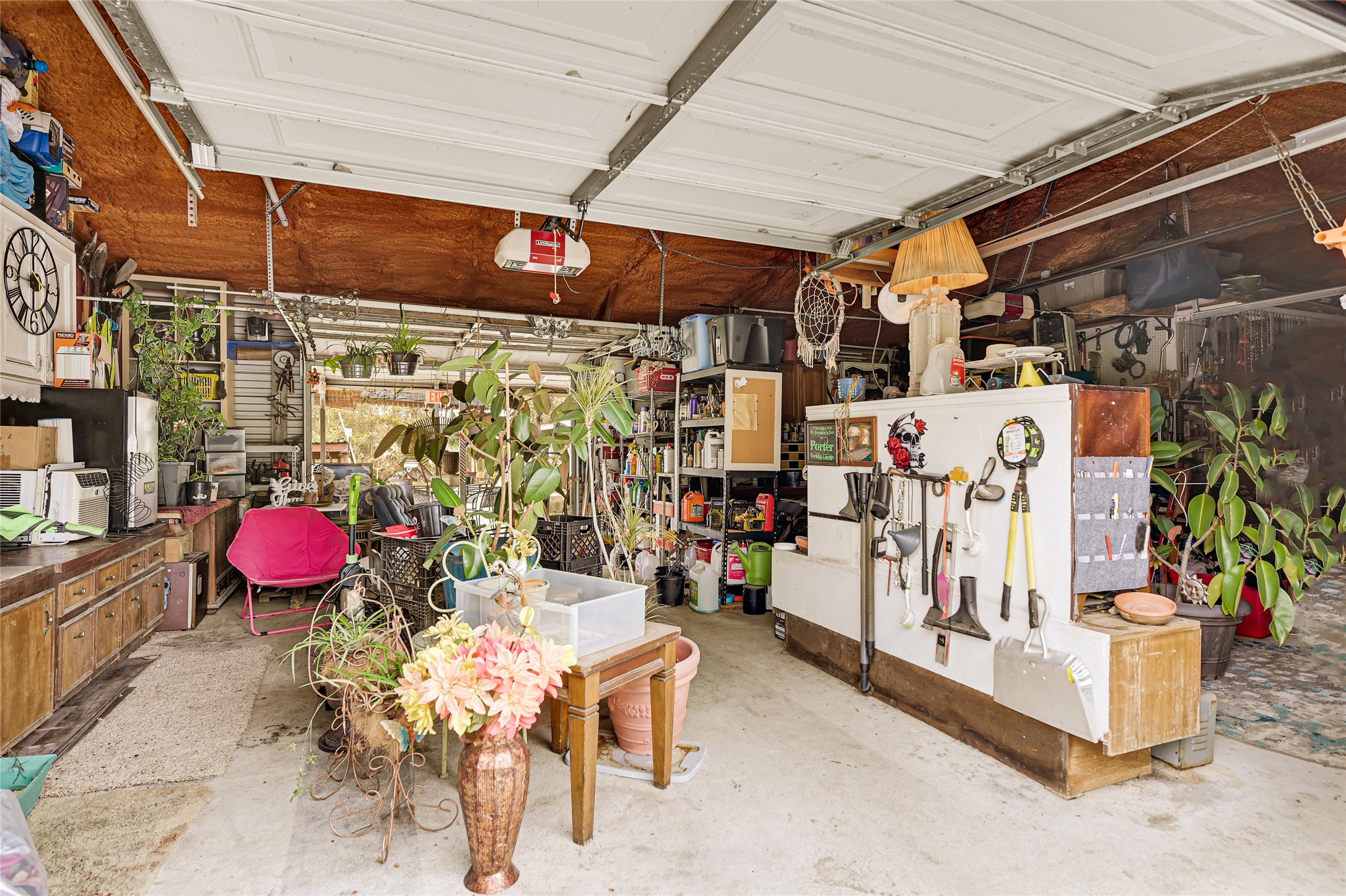 17106 Pickering Road Conroe, TX 77302 - Photo 45 of 50 a view of store room with clothes