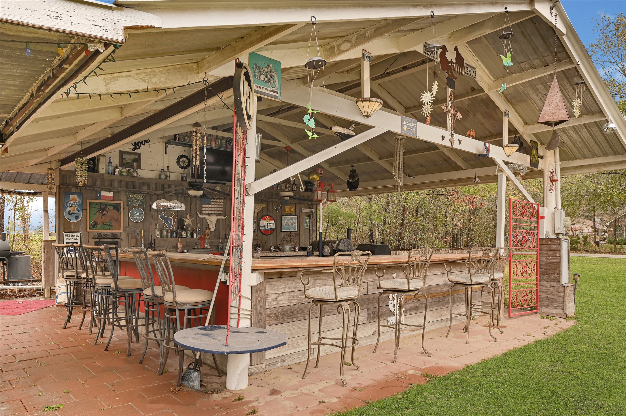 17106 Pickering Road Conroe, TX 77302 - Photo 5 of 50 a view of a patio with a table and chairs