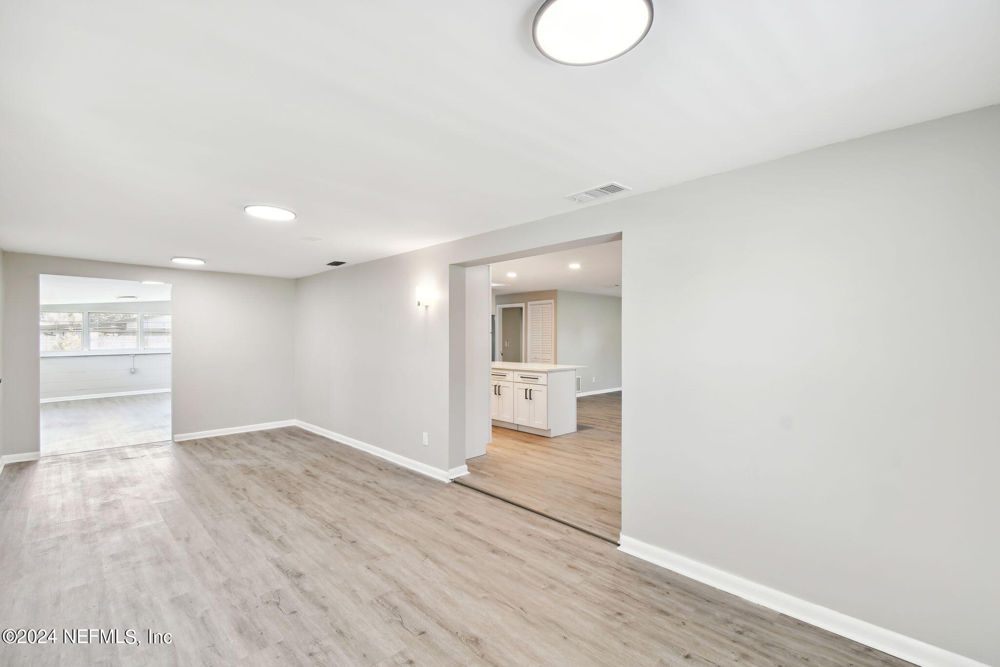 7518 Pinnacle Drive Jacksonville, FL 32221 - Photo 12 of 28 a view of a room with wooden floor and bathroom