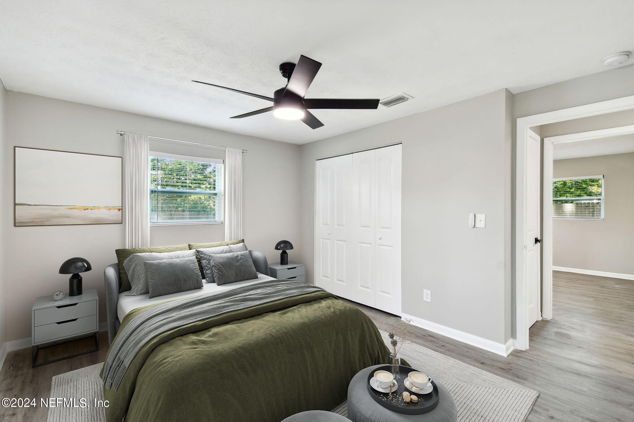 7518 Pinnacle Drive Jacksonville, FL 32221 - Photo 15 of 28 a bedroom with a bed and window