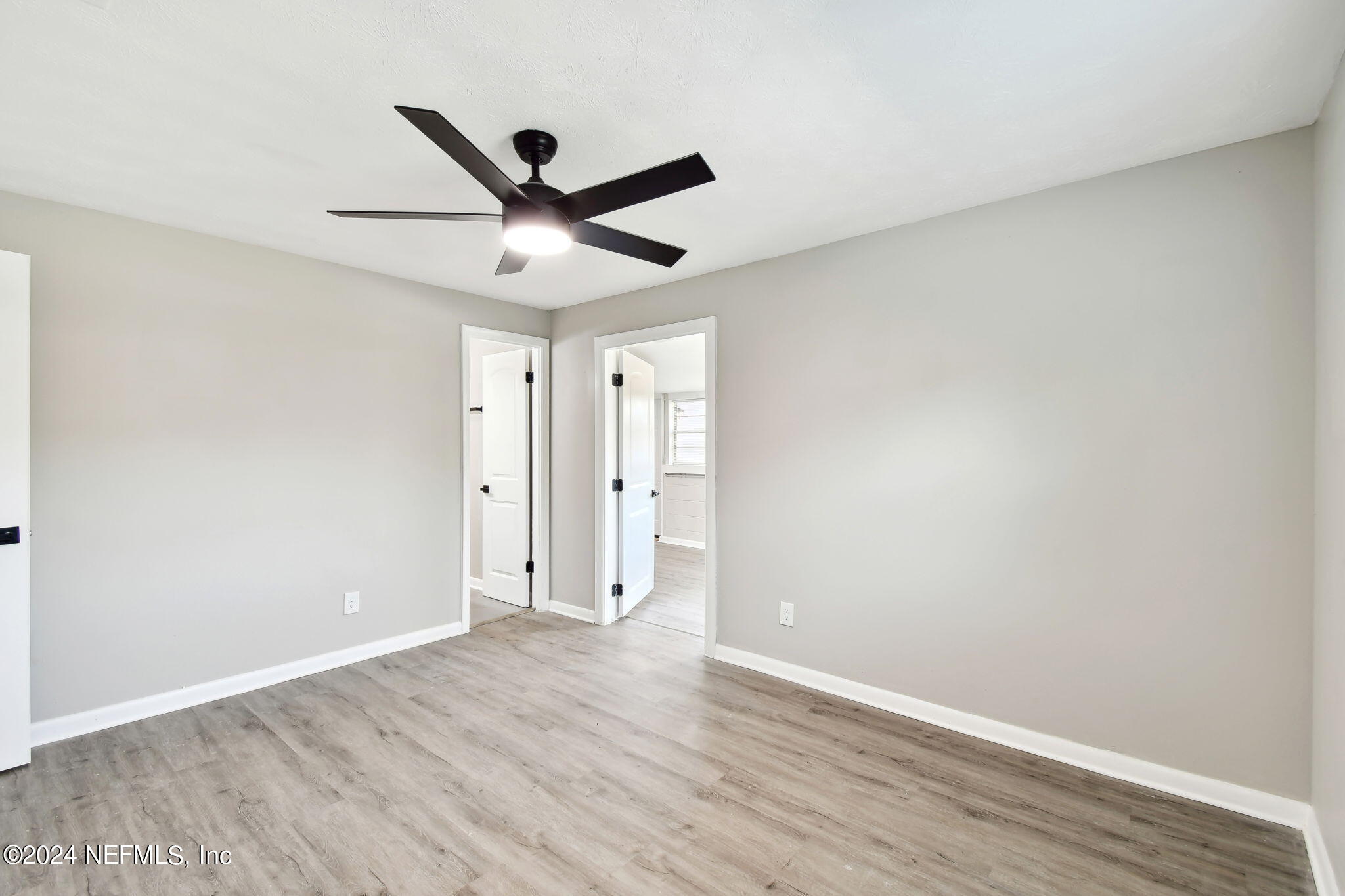 7518 Pinnacle Drive Jacksonville, FL 32221 - Photo 16 of 28 wooden floor in an empty room