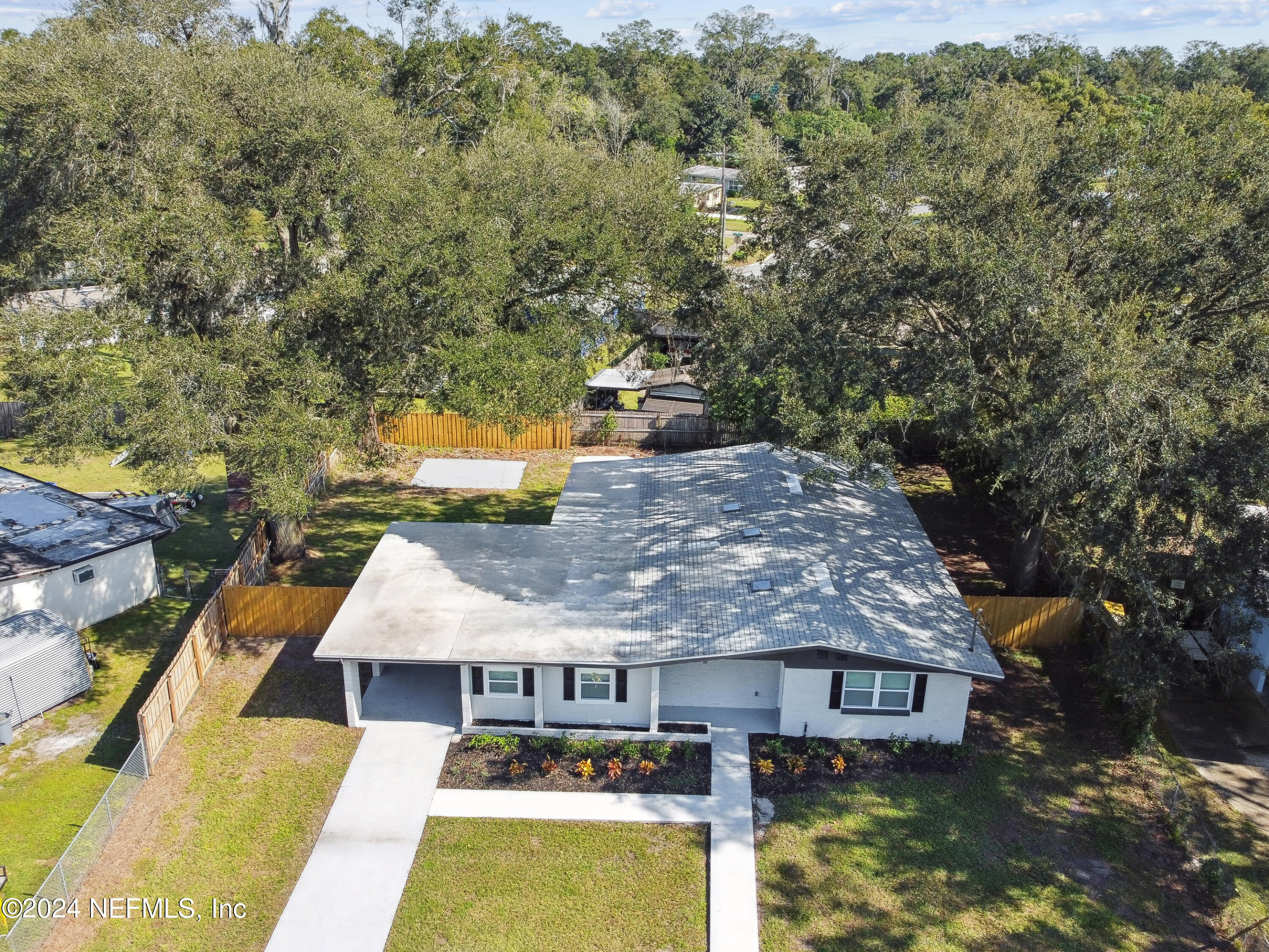 7518 Pinnacle Drive Jacksonville, FL 32221 - Photo 28 of 28 an aerial view of house with yard space and swimming pool