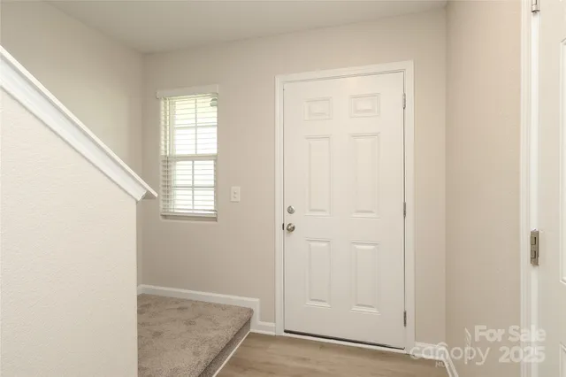 a view of an entryway with a window