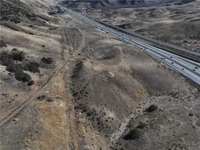 a view of a yard with wooden floor