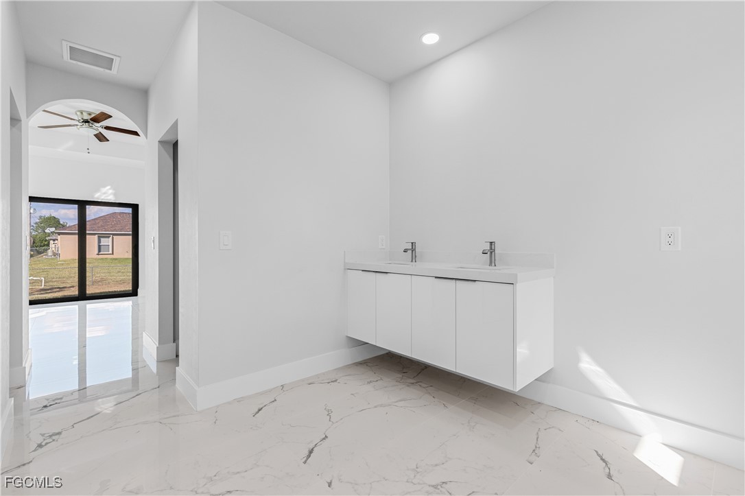 3728 9th Street West Lehigh Acres, FL 33971 - Photo 21 of 35 a view of a hallway with closet