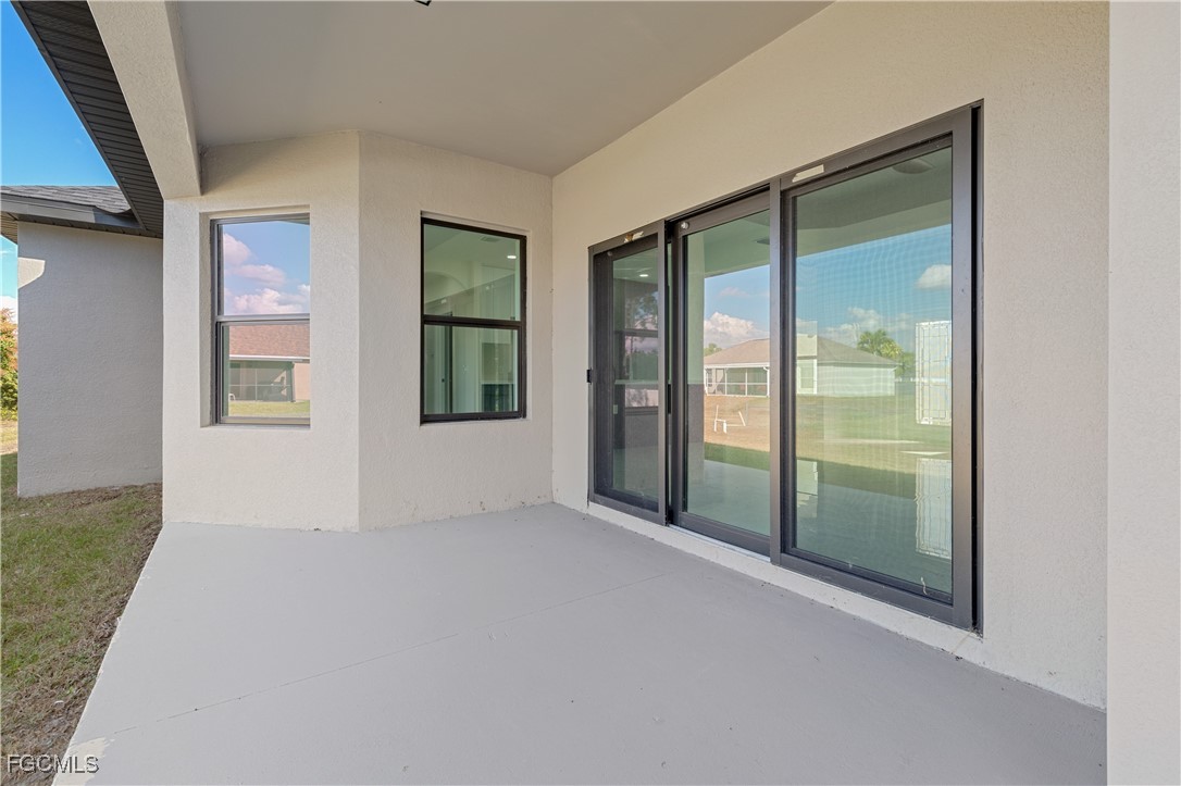 3728 9th Street West Lehigh Acres, FL 33971 - Photo 26 of 35 an empty room with windows and closet