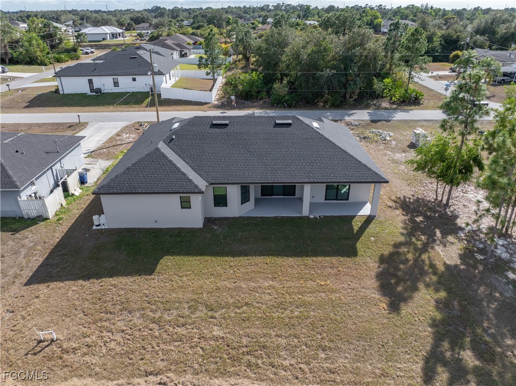 3728 9th Street West Lehigh Acres, FL 33971 - Photo 30 of 35 an aerial view of a house