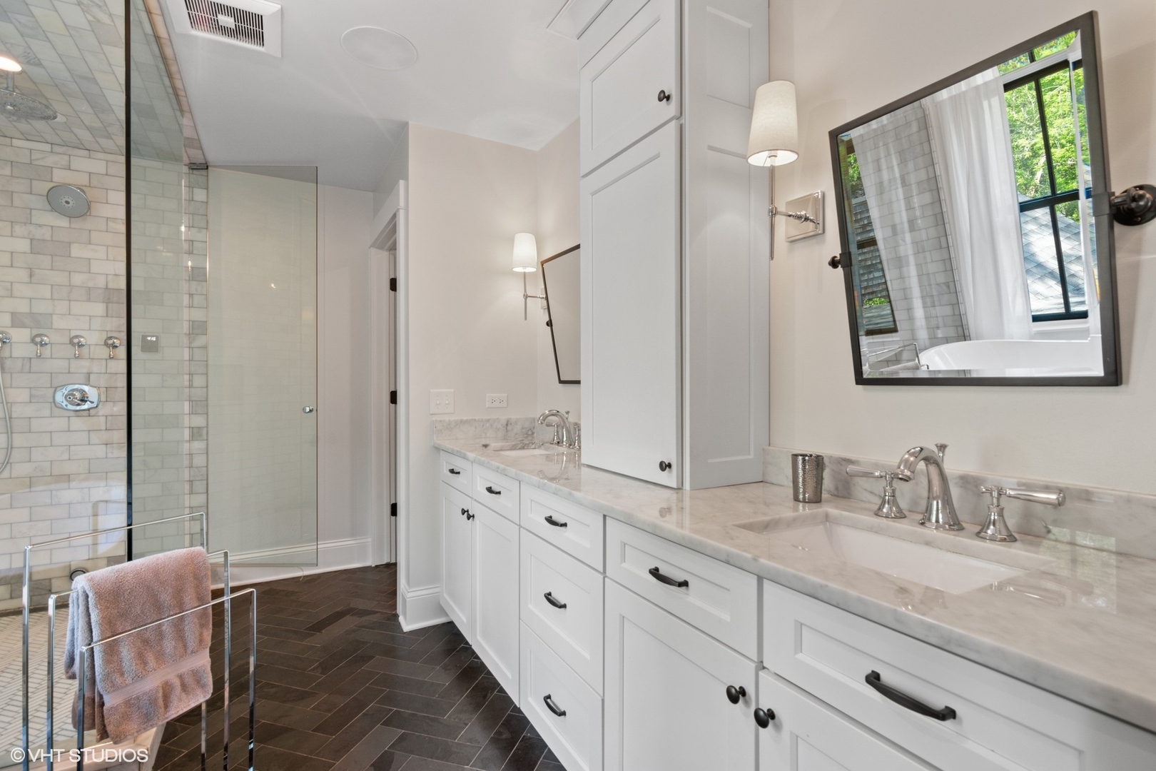735 Baldwin Road Highland Park, IL 60035 - Photo 13 of 30 a bathroom with double vanity sink a mirror and a shower