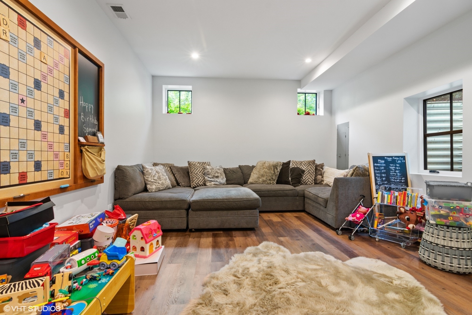 735 Baldwin Road Highland Park, IL 60035 - Photo 20 of 30 a living room with furniture and a flat screen tv