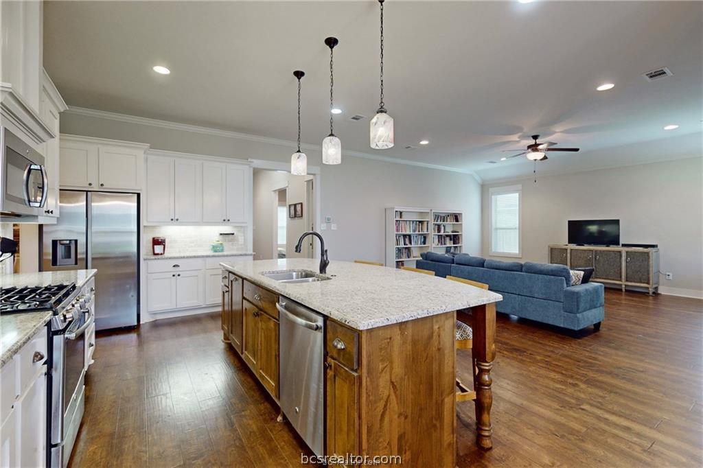 3007 Embers Loop Bryan, TX 77808 - Photo 7 of 27 Granite countertops & large island