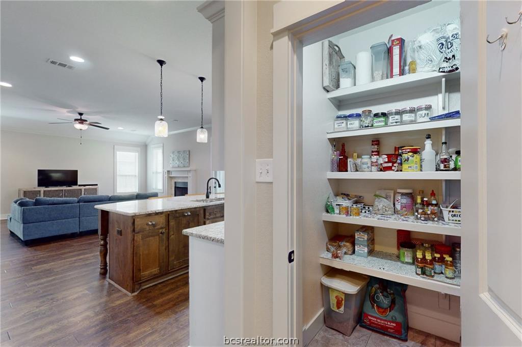 3007 Embers Loop Bryan, TX 77808 - Photo 9 of 27 Walk-in pantry with added storage
