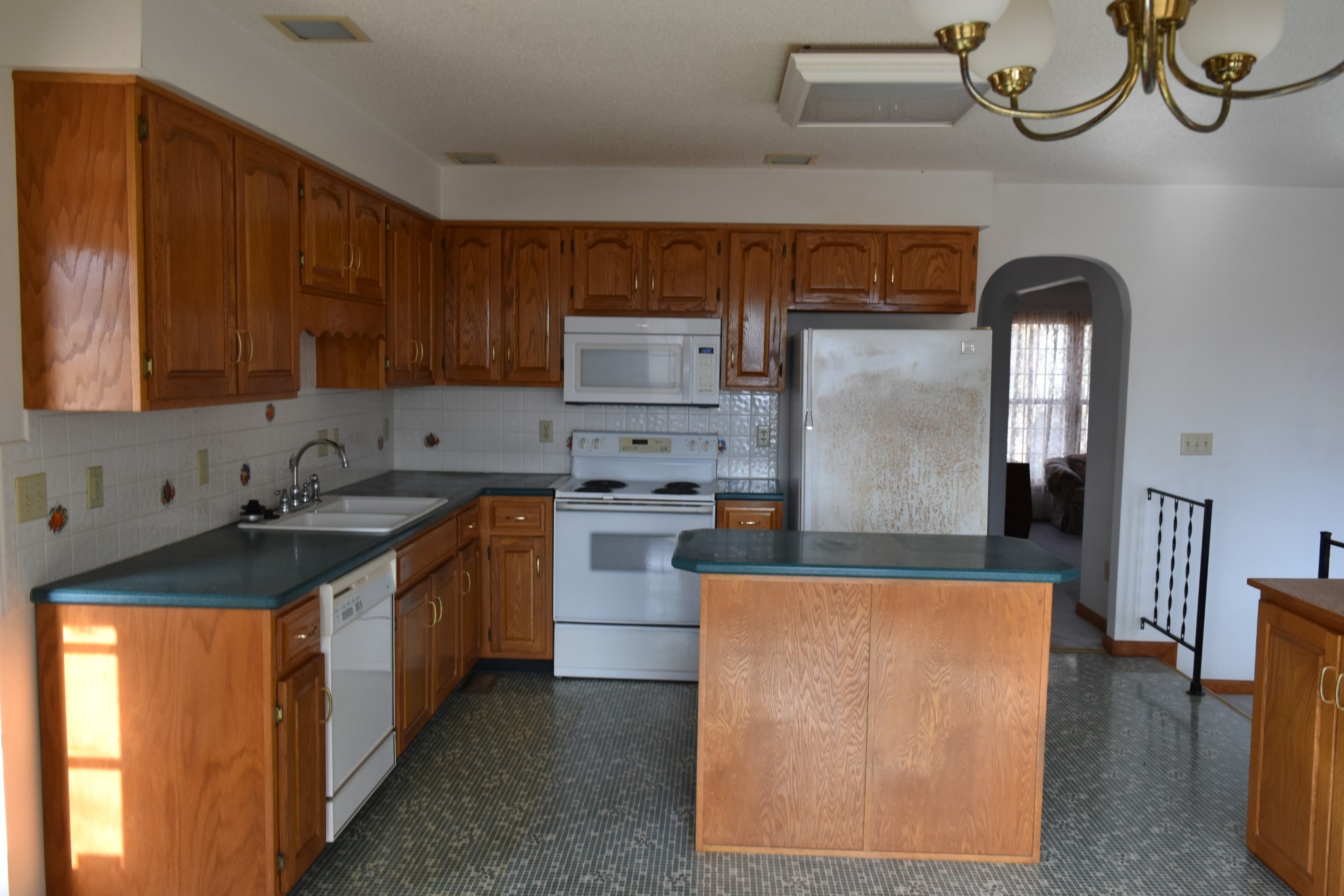 1454 Stagecoach Road Sewanee, TN 37375 - Photo 21 of 71 a kitchen with stainless steel appliances granite countertop a sink a stove and a refrigerator