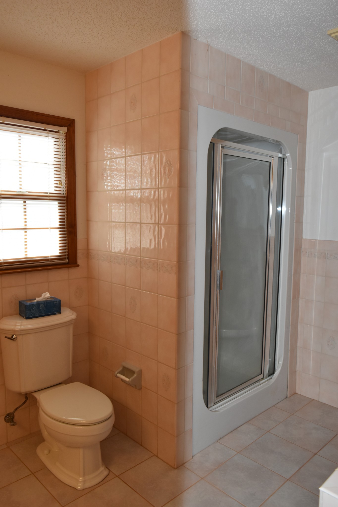 1454 Stagecoach Road Sewanee, TN 37375 - Photo 34 of 71 a white toilet sitting next to a bathroom sink