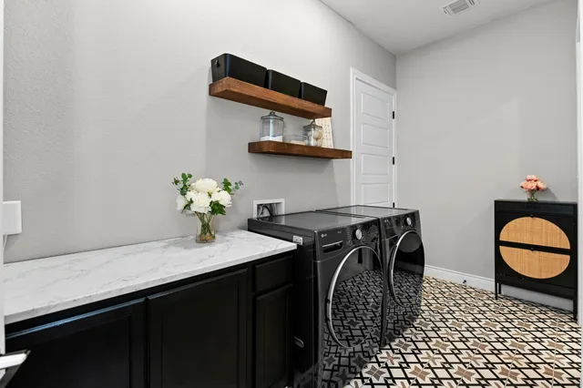 a dining room with furniture and wooden floor