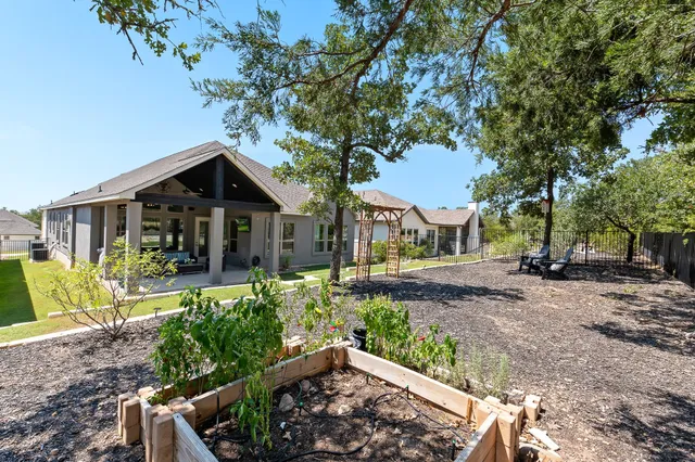 a view of a house with porch and sitting area