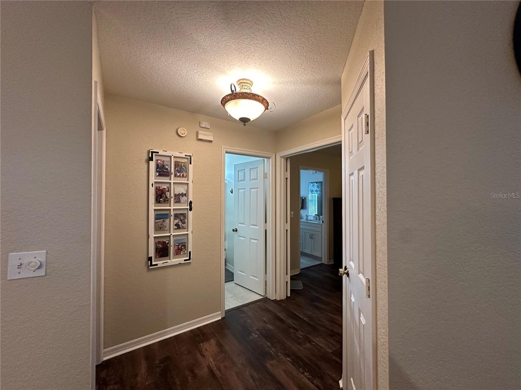 8649 Southwest 108th Ln Road Ocala, FL 34481 - Photo 19 of 72 HALLWAY TO BEDROOMS