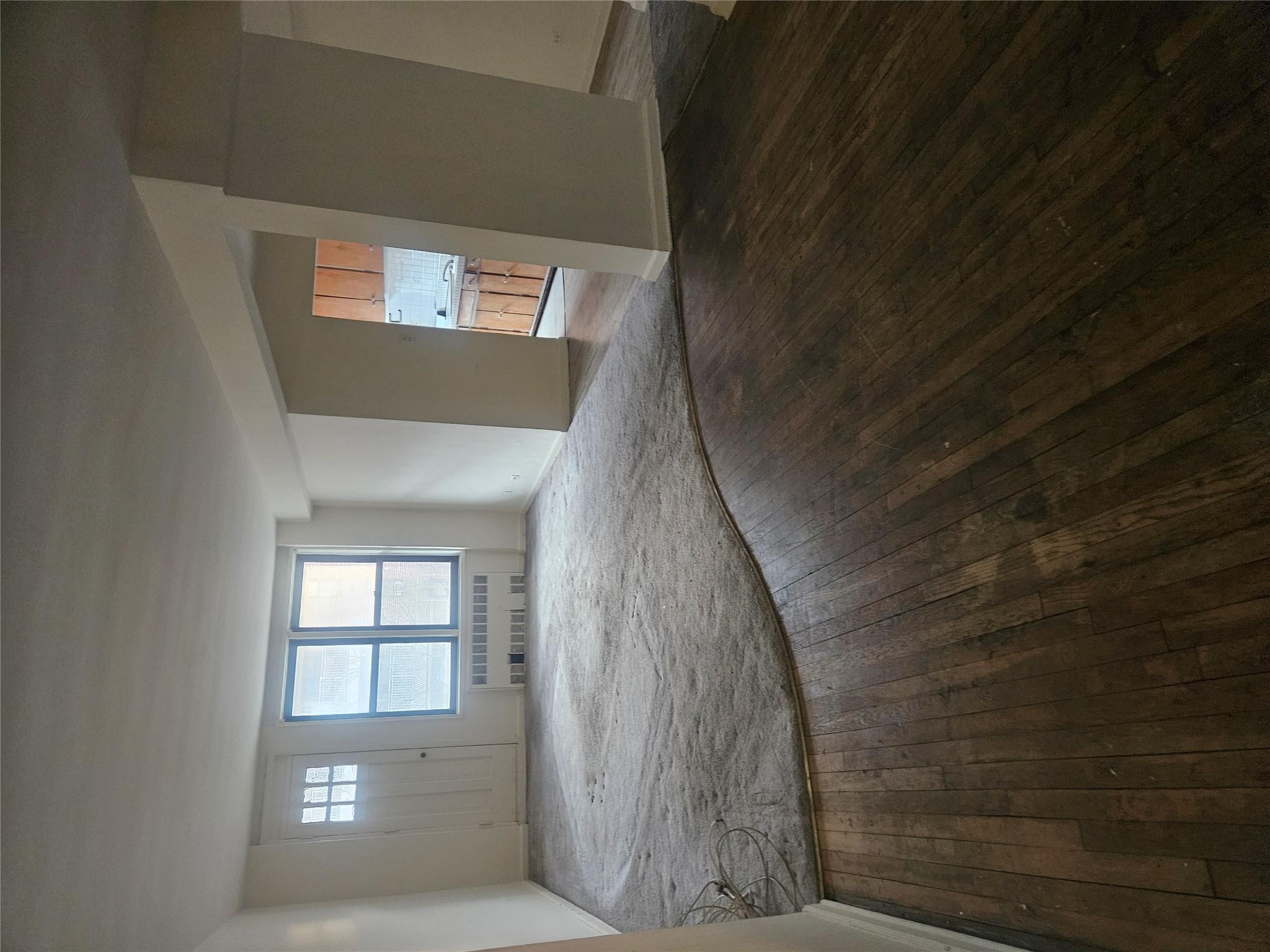 63-09 108th Street, Unit 5L Queens, NY 11375 - Photo 2 of 5 a view of empty room with window