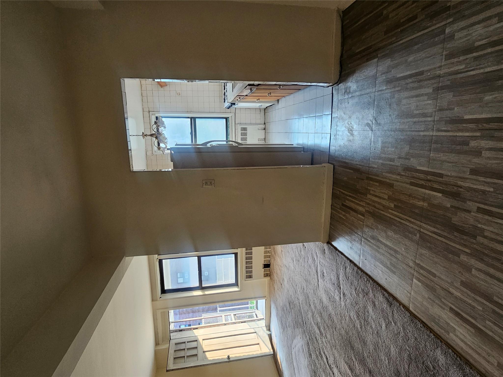 63-09 108th Street, Unit 5L Queens, NY 11375 - Photo 4 of 5 a view of empty room with wooden floor