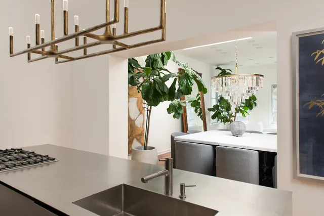 a bedroom with a bed and a mirror