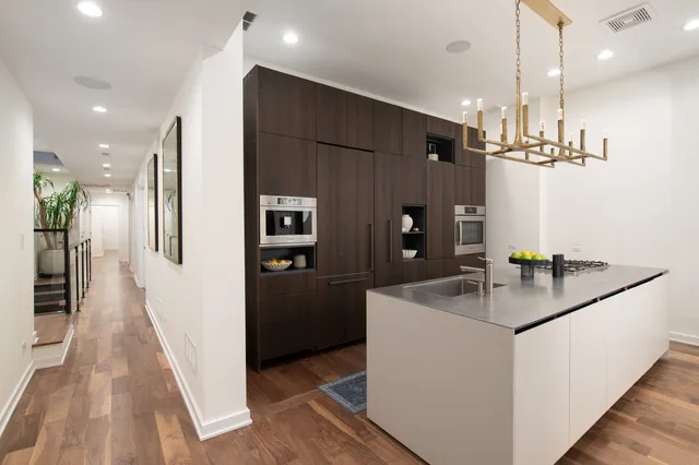 a bathroom with a sink double vanity and a mirror