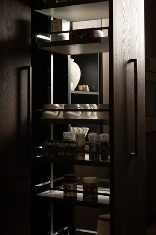 a view of hallway with stairs and wooden floor