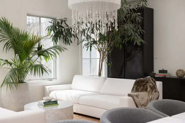 a vase of flowers sitting on a table