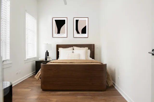 a bathroom with a sink double vanity and a mirror