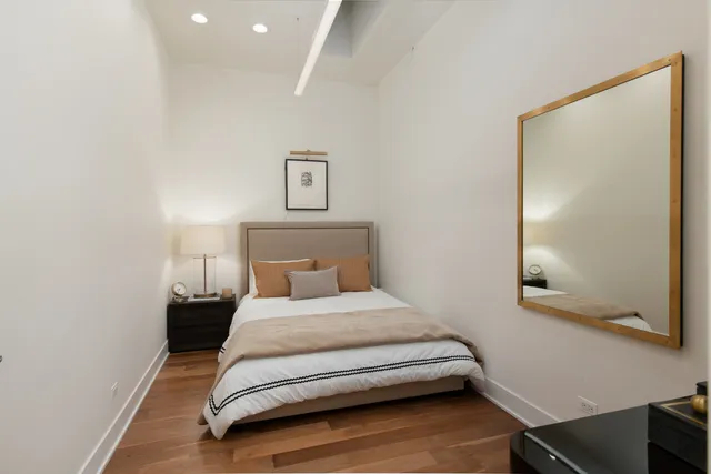 a view of a living room and with potted plants