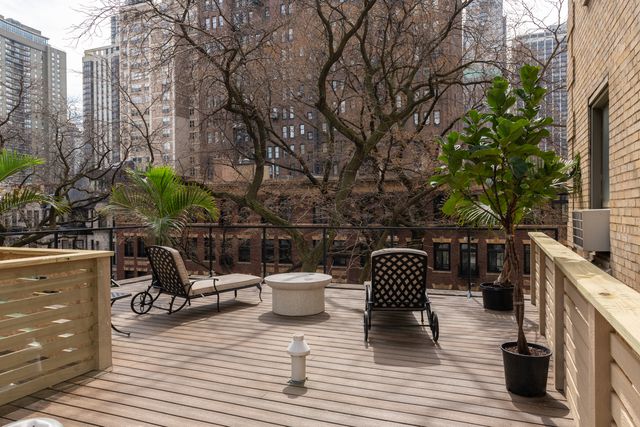 a picture of a bench in a white wall