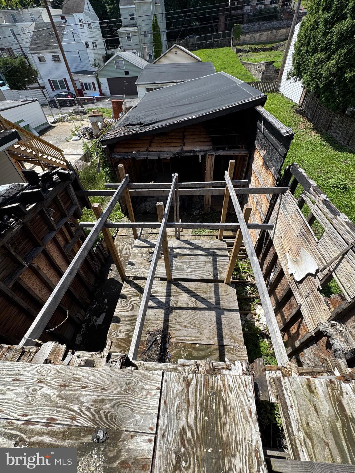 426 Centre Street Ashland, PA 17921 - Photo 28 of 78 a roof deck with table and chairs a barbeque