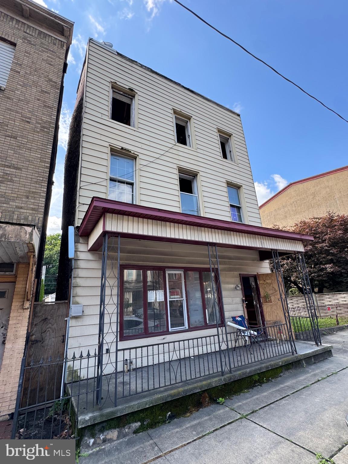 426 Centre Street Ashland, PA 17921 - Photo 5 of 78 a view of a house with iron fence