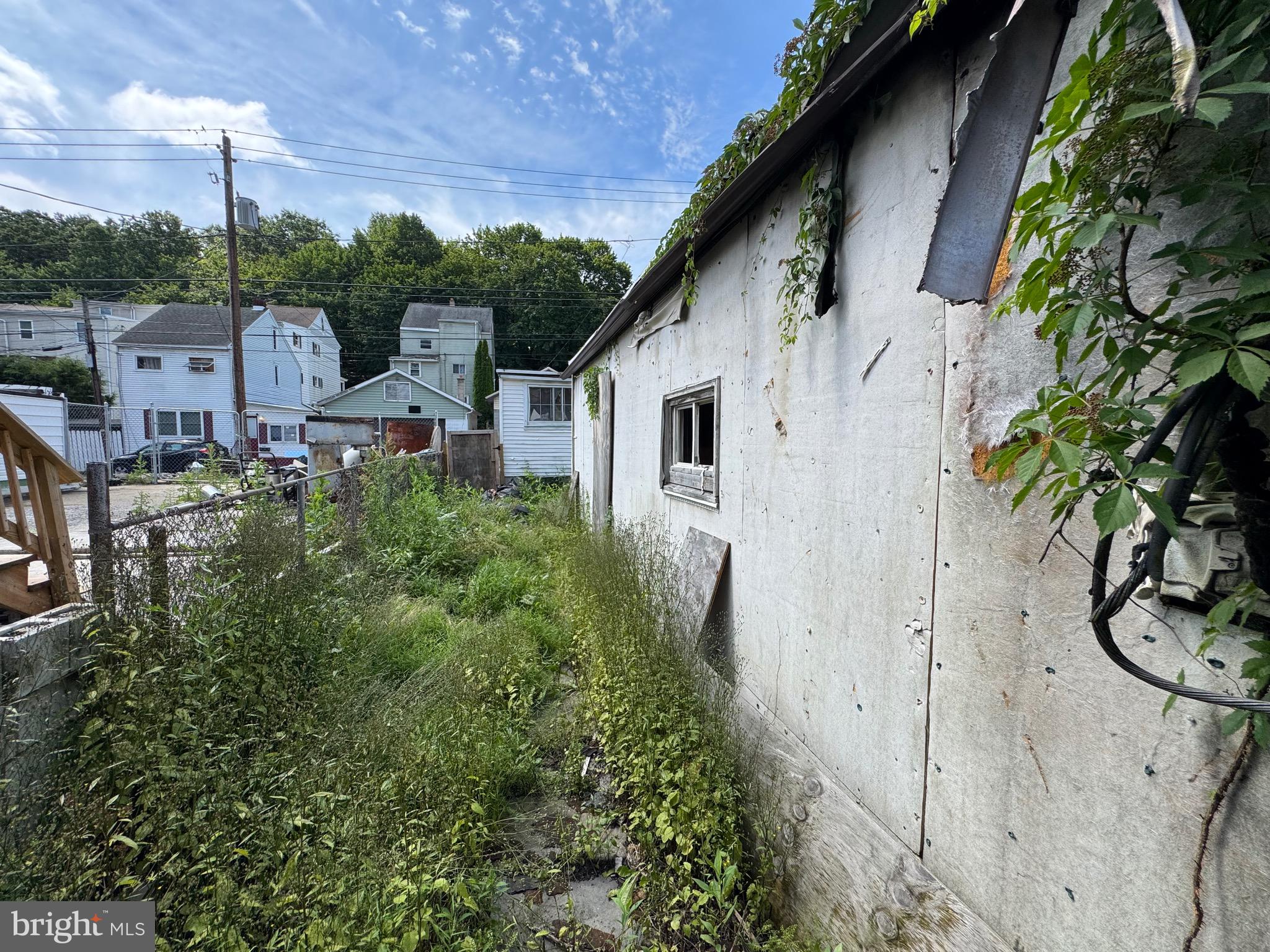 426 Centre Street Ashland, PA 17921 - Photo 63 of 78 a white house with trees in front of it