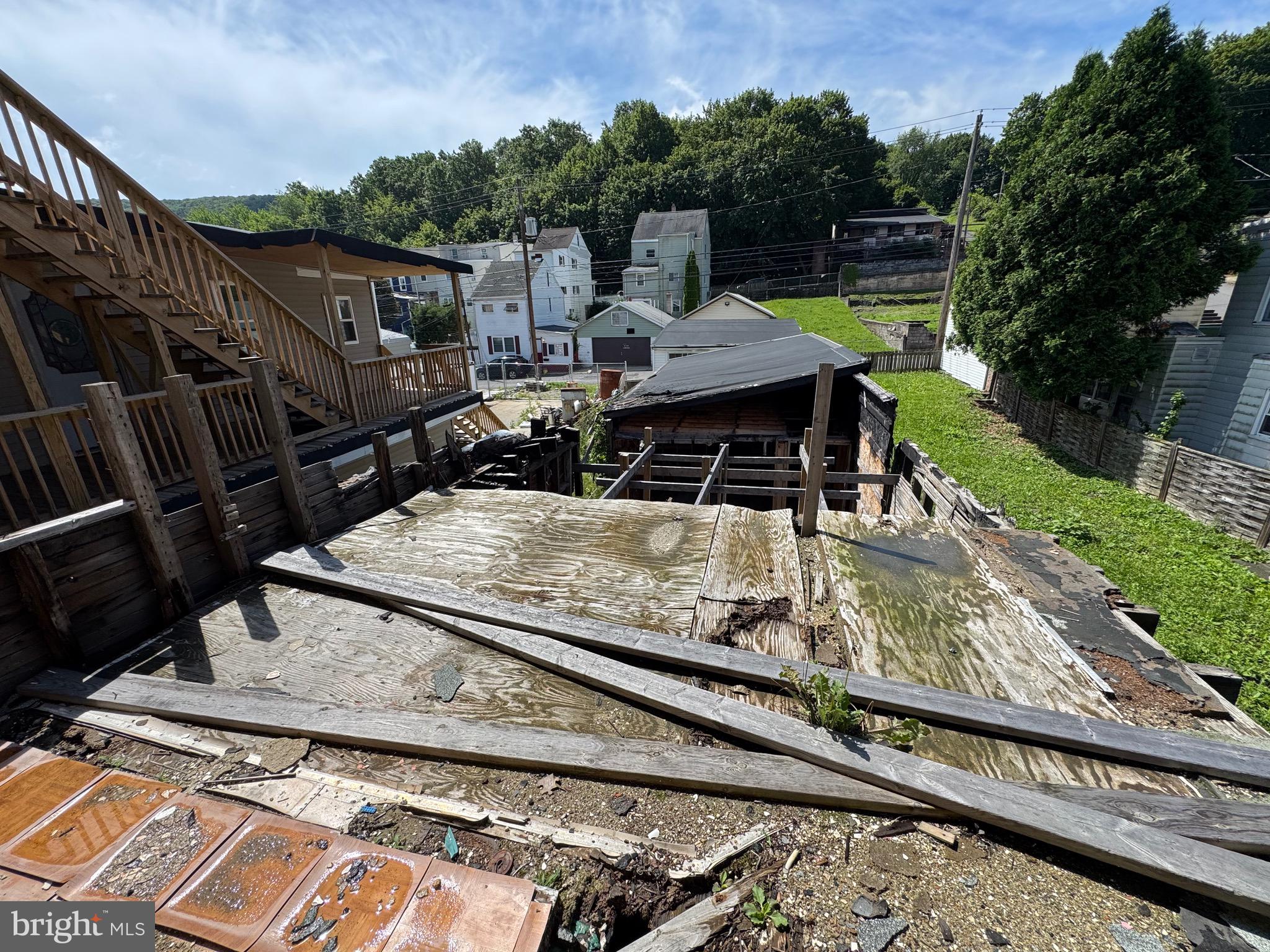 426 Centre Street Ashland, PA 17921 - Photo 74 of 78 a view of a roof deck with wooden floor and fence