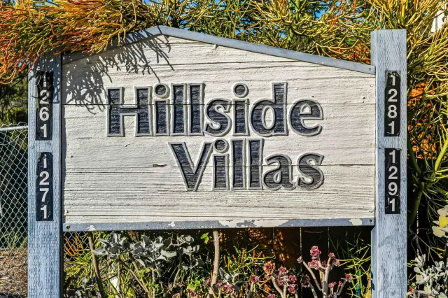 a front view of a house with garage
