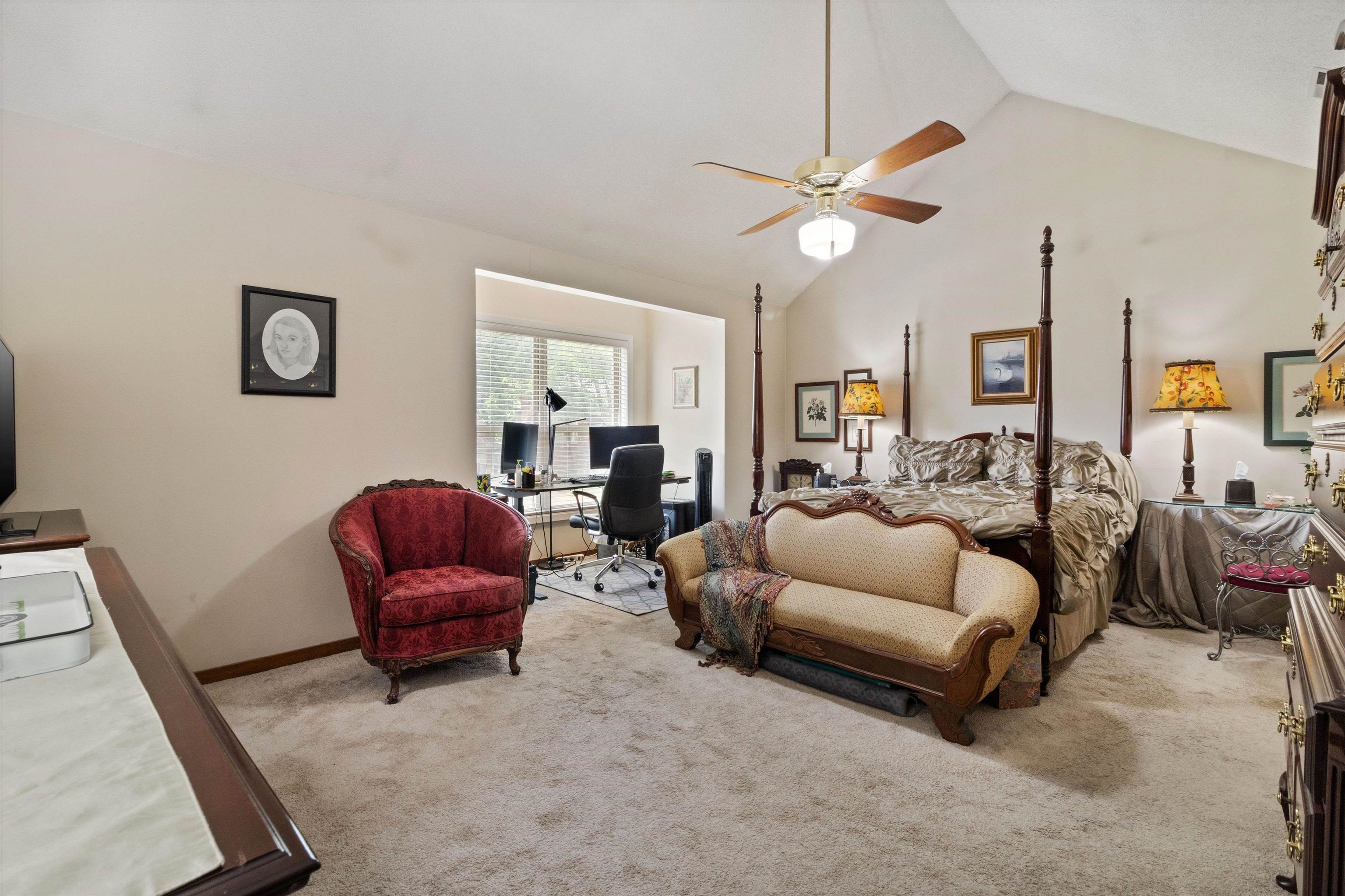 2010 Newfields Road Germantown, TN 38139 - Photo 13 of 28 Bedroom with a desk, lofted ceiling, light colored carpet, a ceiling fan, and baseboards