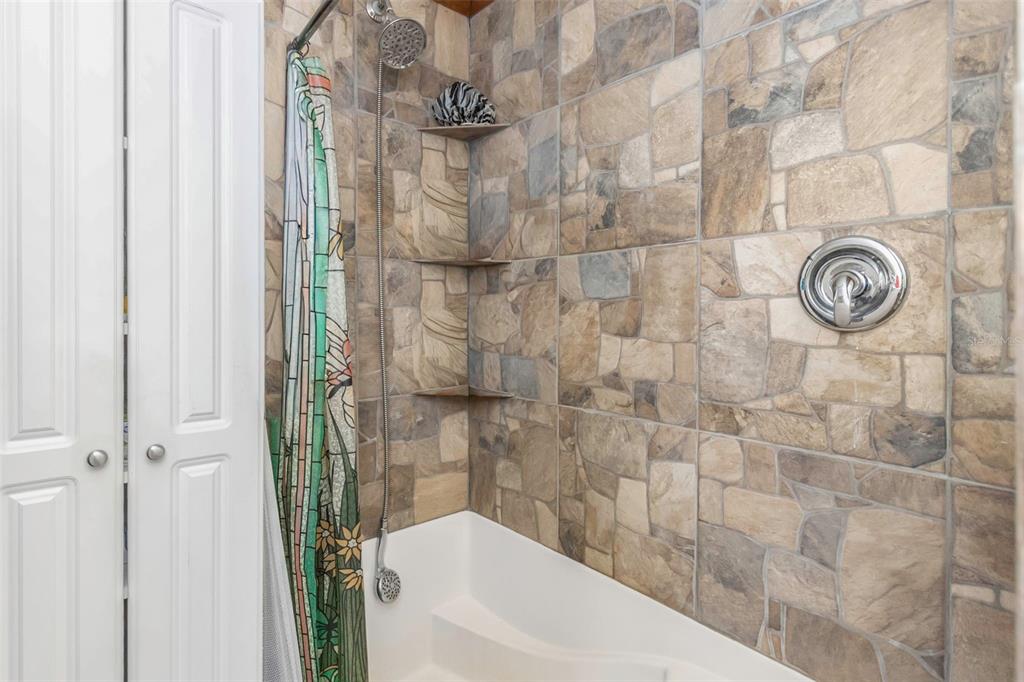 17500 Marsh Road Lutz, FL 33558 - Photo 11 of 80 a bathroom with a bathtub