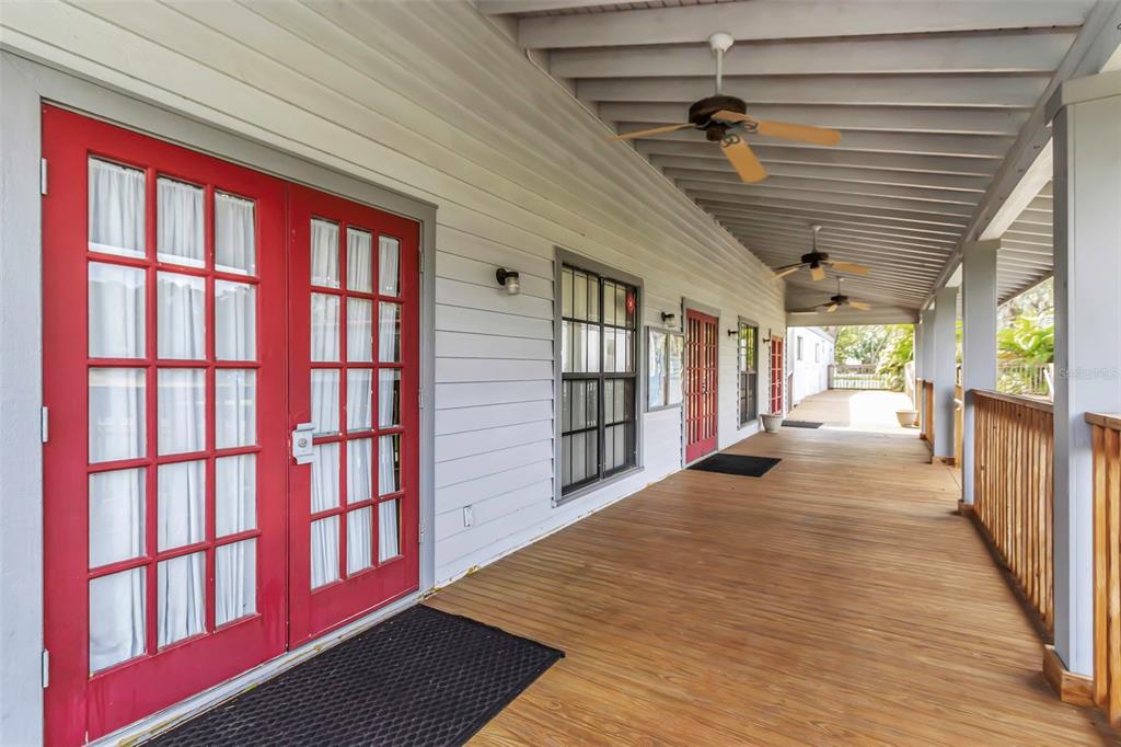 17500 Marsh Road Lutz, FL 33558 - Photo 39 of 80 a view of hallway with wooden floor and stairs