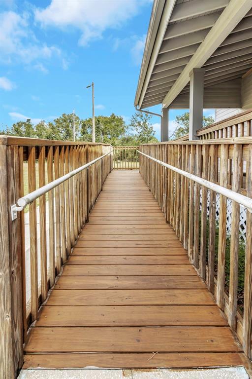 17500 Marsh Road Lutz, FL 33558 - Photo 41 of 80 a view of a balcony with wooden floor
