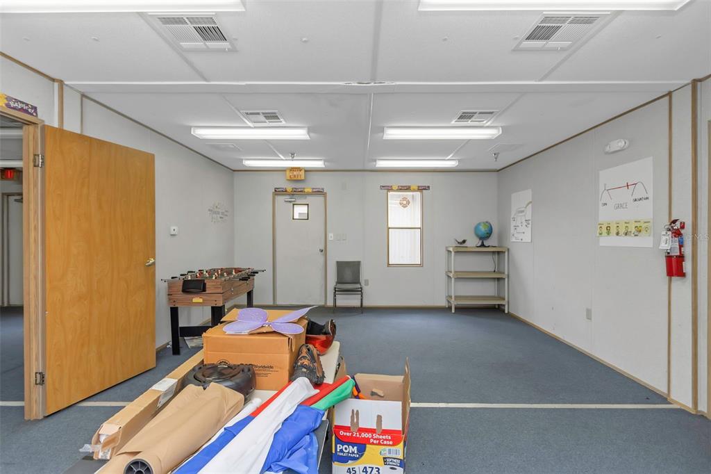 17500 Marsh Road Lutz, FL 33558 - Photo 53 of 80 a room with furniture and window