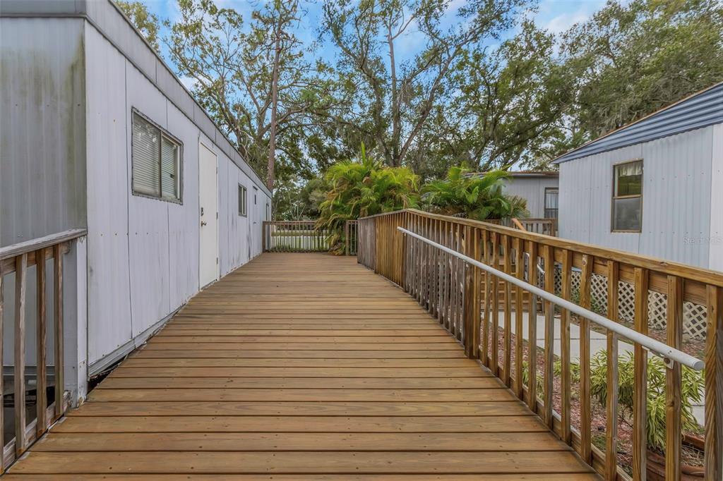 17500 Marsh Road Lutz, FL 33558 - Photo 60 of 80 a view of a house with wooden deck